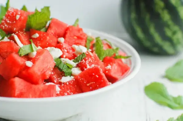 Juicy watermelon with fruit salad
